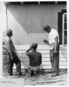 These men were placing siding on their Flanner House Homes, probably in the 1950s (image University Library).